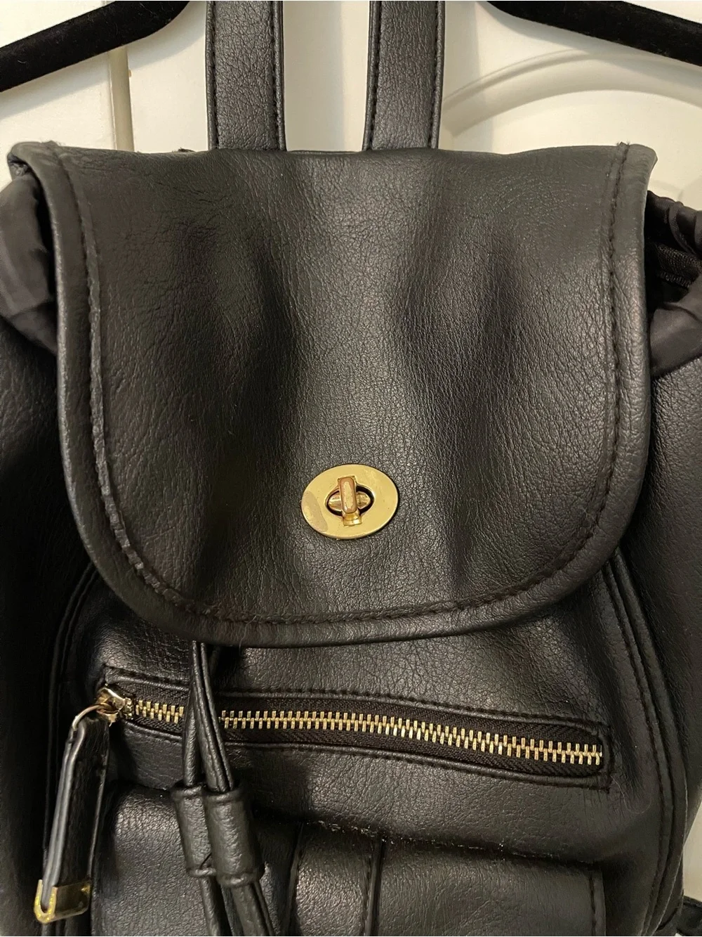 Sleek Black Faux Leather Mini Backpack with Gold Accents